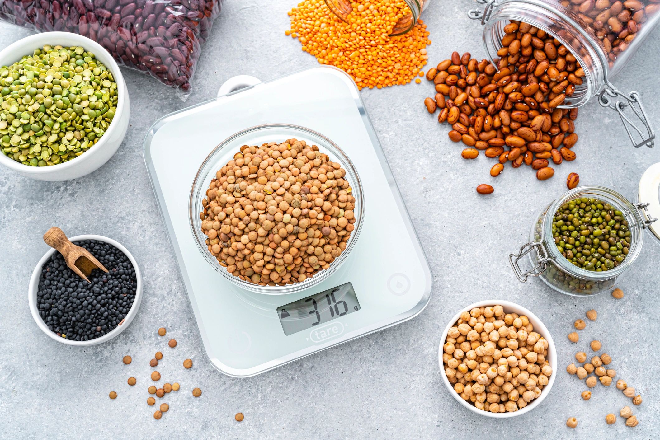Assorted lentils and legumes in bowls
